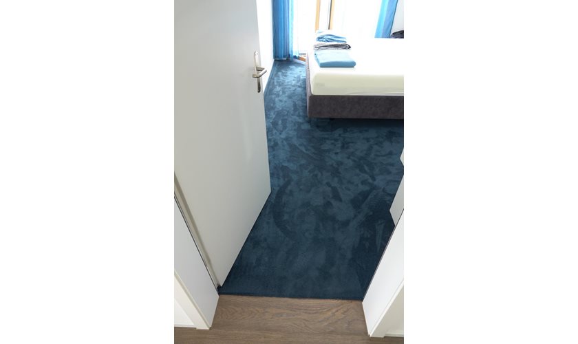 Ferienwohnung Designbelag und Teppich